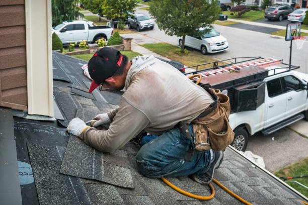 Professional Roofing technician working in Millville, MA